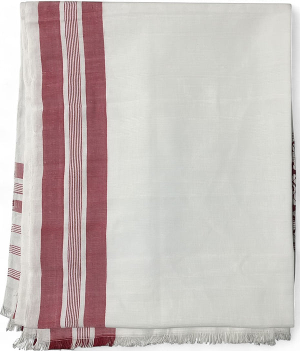 Pride of Assam white and red handloom gamusa made of pokua fabric with floral motif on one side and fringed edges.