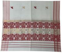 Pride of Assam white jute gamucha with red and gold floral motifs and striped borders. Handwoven, suitable for face, hair, hand, wear, and special occasions.